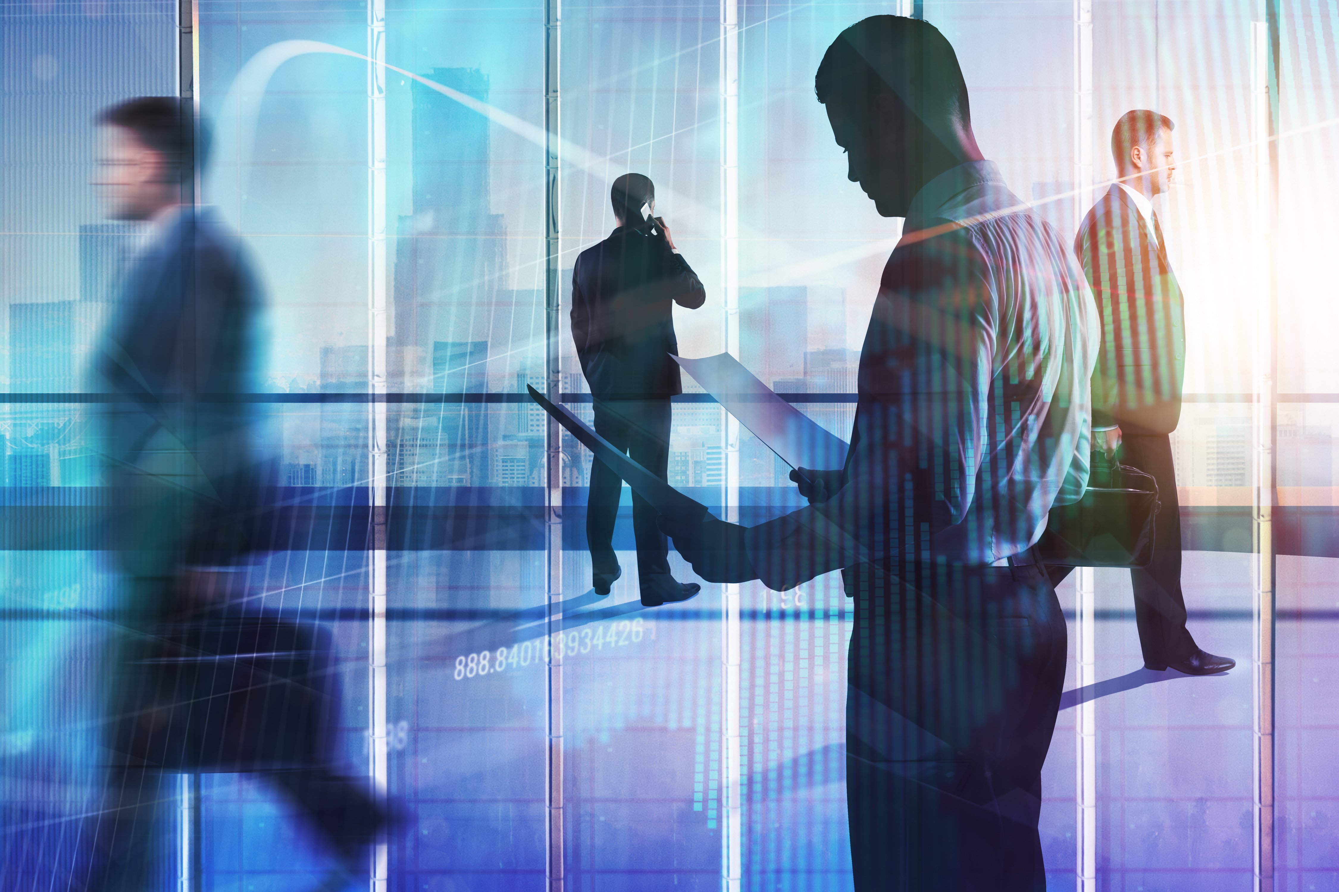 Biznesa cilvēki modernā ofisā, strādājot un sazinoties, ar pilsētas ainavu fonā.