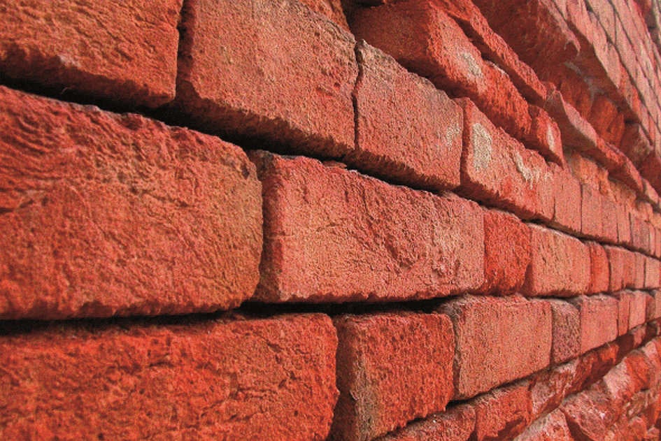 Close-up of a masonry brick wall