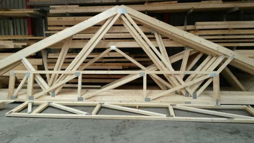 Wooden building materials connected with metal nail plates