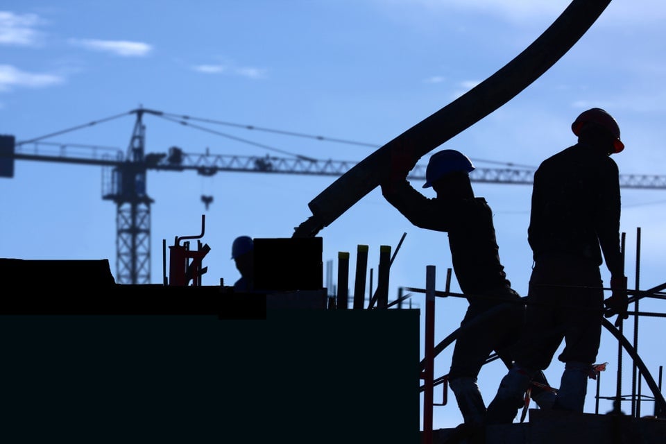 Mannen op de bouwplaats